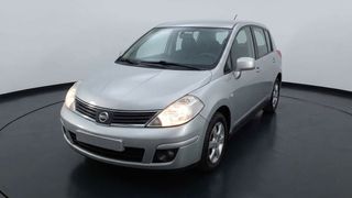 Nissan • Tiida