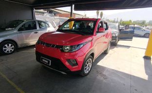 Mahindra • Kuv 100