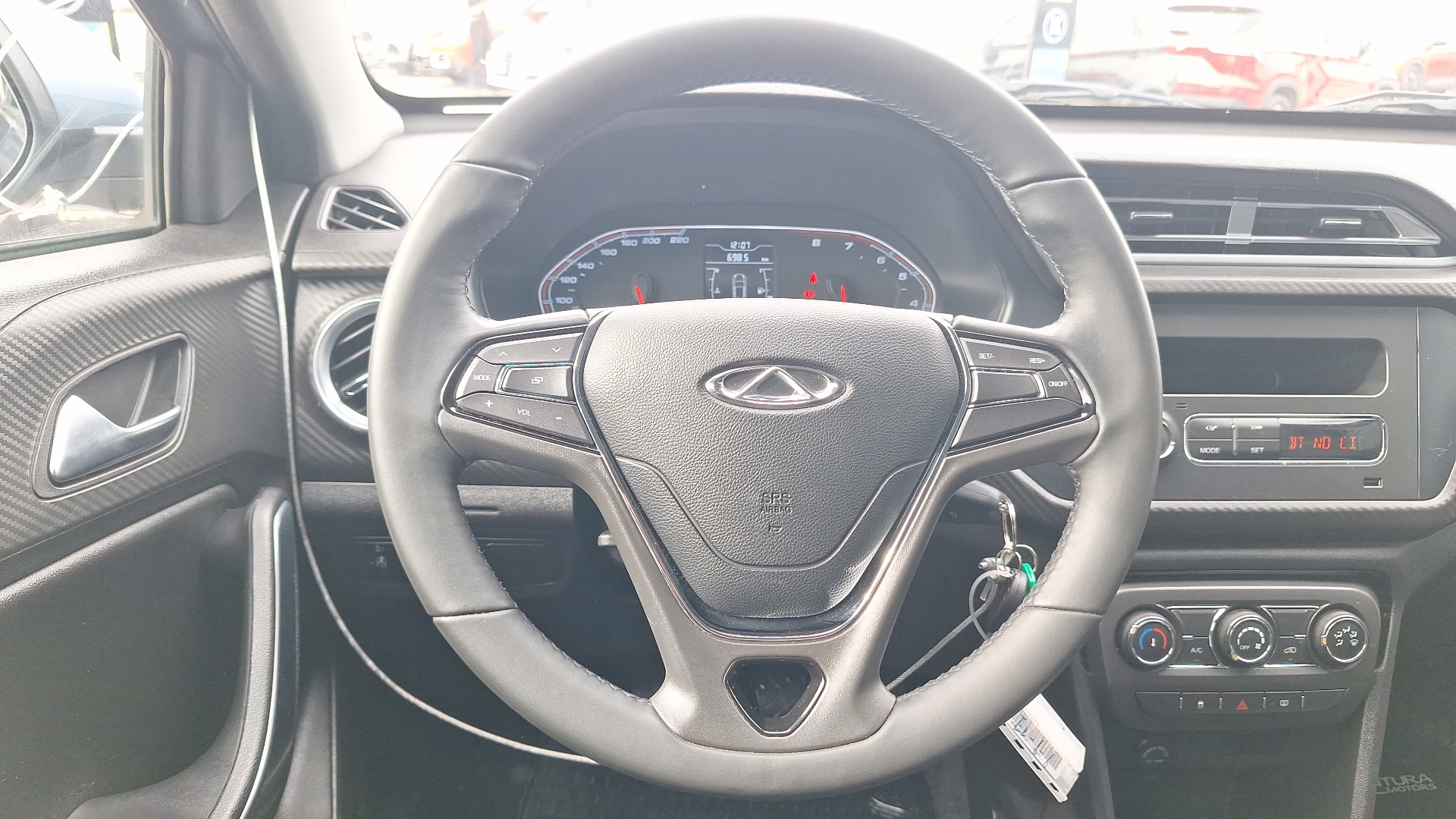 Chery Tiggo 2 — foto 8 de 14