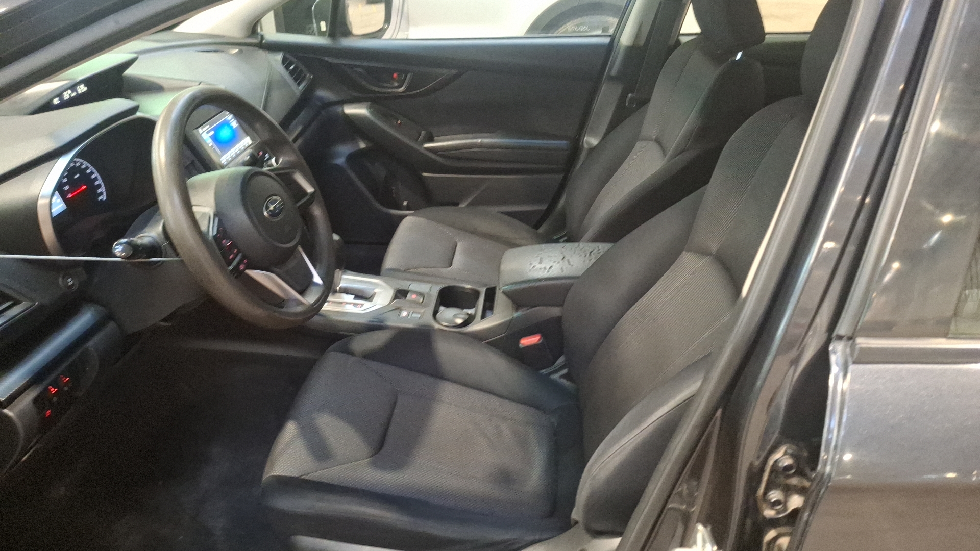 Subaru Impreza — foto 13 de 16