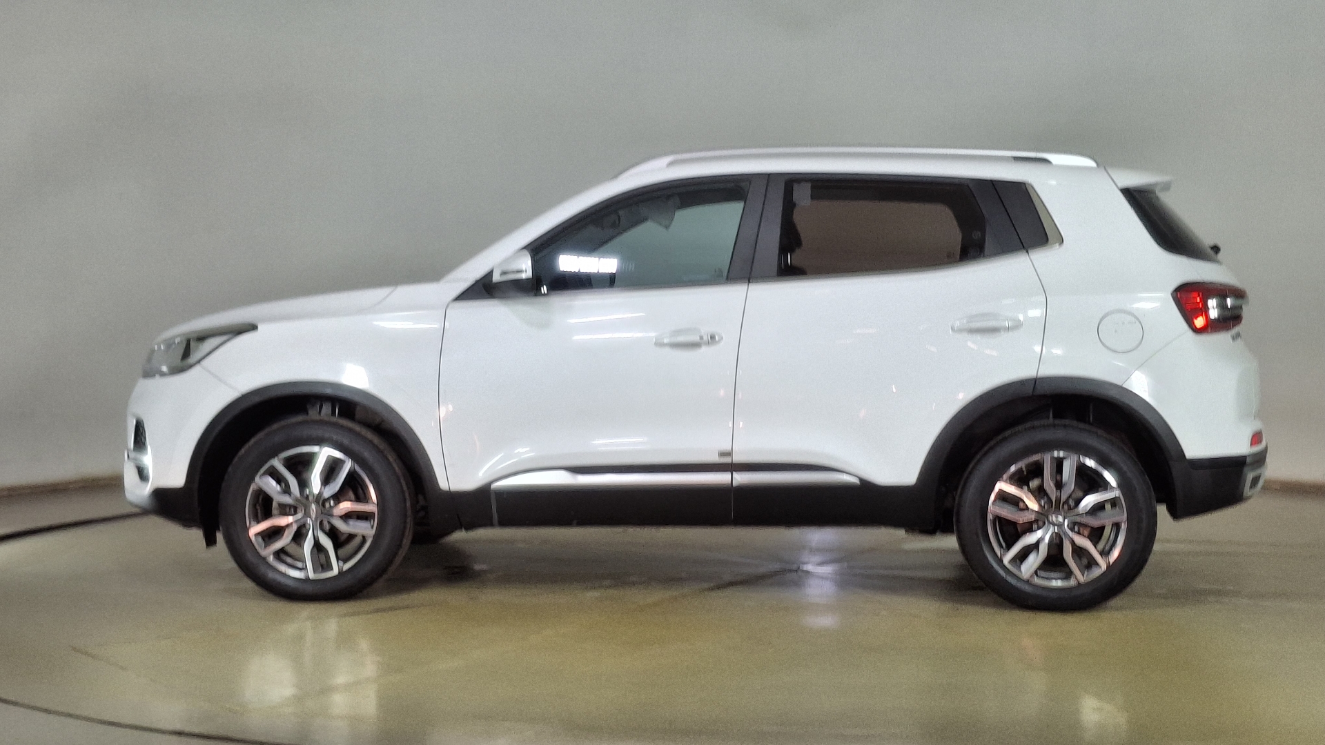 Chery Tiggo 3 — foto 7 de 16