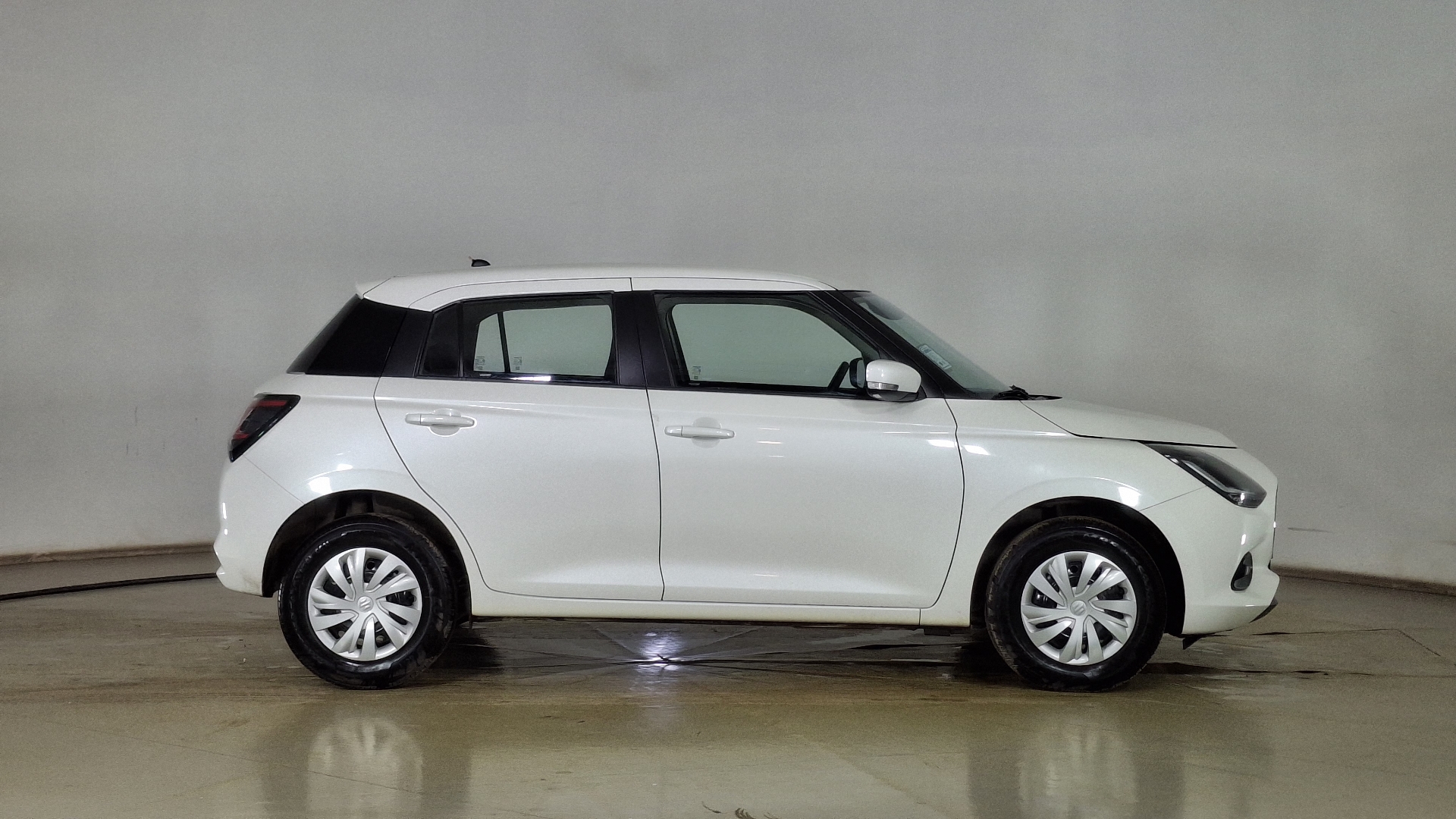 Suzuki Swift — foto 4 de 16